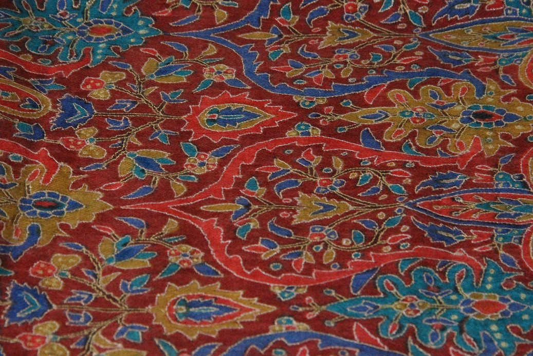 Close up of the hand-embroidered ground